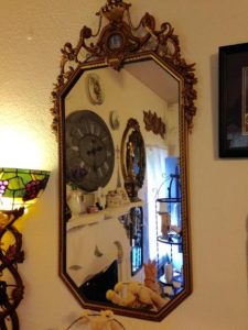 This 19th century mirror has a Wedgewood medallion